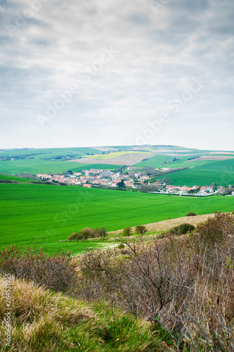 view on the landscape and the village l' Escale when mounting the cliff of Cap Blanc Nez in springtime in the region of Nord Pas de Calais