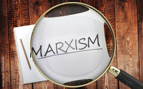 Study, learn and explore marxism - pictured as a magnifying glass enlarging word marxism, symbolizes analyzing, inspecting and researching the meaning of marxism, 3d illustration