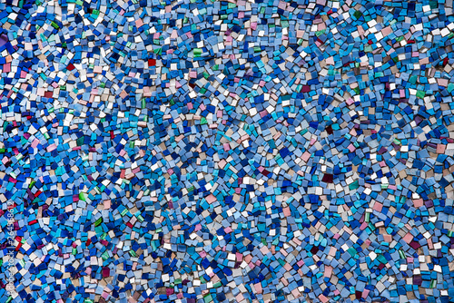 Part mosaic as decorative texture background. Selective focus. Abstract Pattern. Abstract blue and black colored ceramic stones