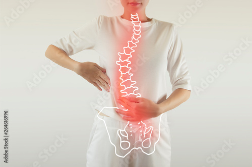 Pain in the spine, a woman with backache