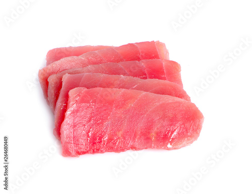 Slices of raw tuna fish meat on white background