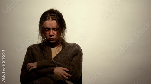 Drug addicted woman suffering withdrawal symptoms undergoing rehabilitation