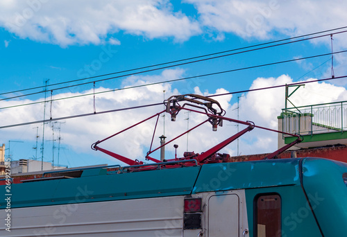 An asymmetrical pantograph connecting the train to the overhead catenary wire.