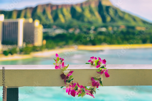 Hawaii background hawaiian flower lei with Waikiki beach landscape.