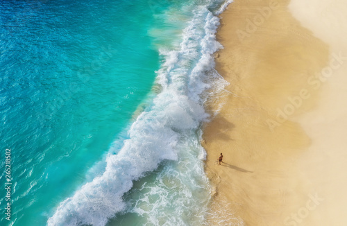 Beach as a background from top view. Waves and azure water as a background. Summer seascape from air. Bali island, Indonesia. Travel - image
