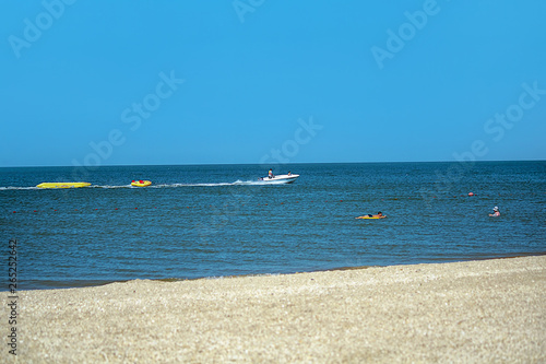 Seascape, beach holiday. The concept of leisure, tourism, travel, weekend. Selective focus.