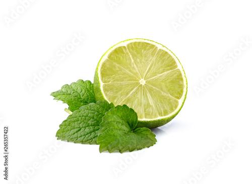 Melissa leafs with lime isolated on white background