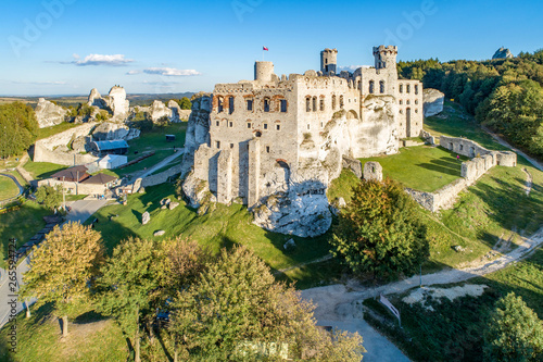 The ruins of medieval castle on the rock in Ogrodzieniec, Poland. One of strongholds called Eagles Nests in Polish Jurassic Highland in Silesia. Aerial view