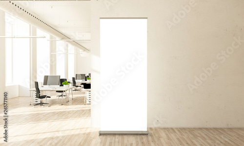 blank roll up banner in minimal office