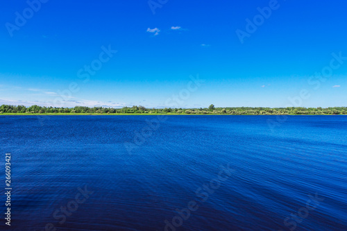view of the kama river on a cloudless summer day