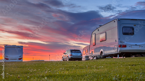 Camping caravans and cars sunset