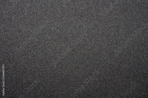 Black sandpaper texture.