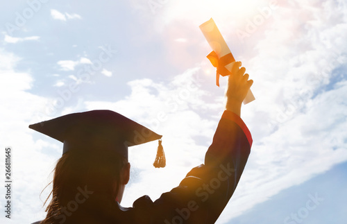 student hand with diploma 