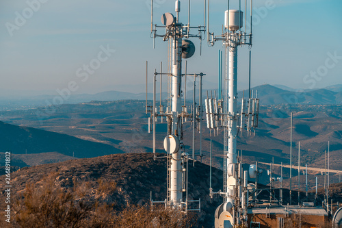 Wireless communication concept. Radio antennas, transmitters on top of hill