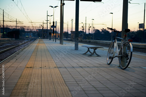 Bicycle at train station of Treviglio town in Italy