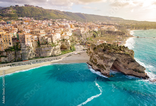 Golden Hour in Tropea: A Stunning Panoramic View of the Iconic Beach, Old Town, and Church on the Cliff