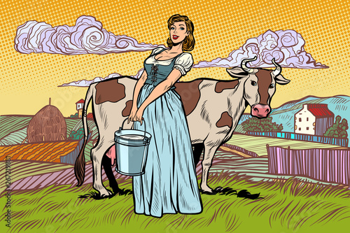 village woman with a bucket of cow milk. farm landscape