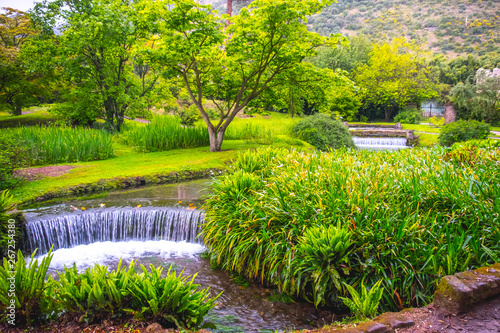 eden garden fairytale waterfall fountain in the Giardino di Ninfa - Cisterna di Latina - Lazio - Italy