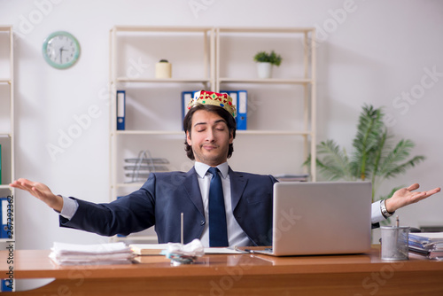 Young king businessman working in the office 