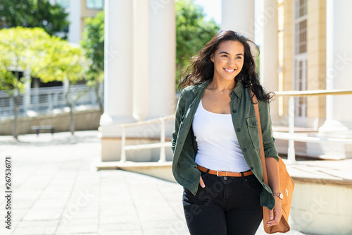 Cheerful curvy girl on street