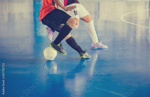 Indoor soccer sports hall. Football futsal player, ball, futsal floor
