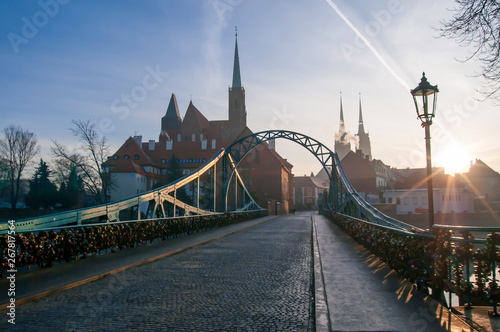 Tumski Bridge and Cathedral of St. John the Baptist twin towers on Ostrow Tumski. Wrocław, Poland 2018