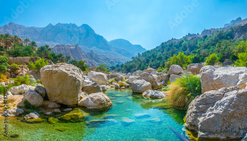 Lagoon with turqoise water in Wadi Tiwi in Oman.