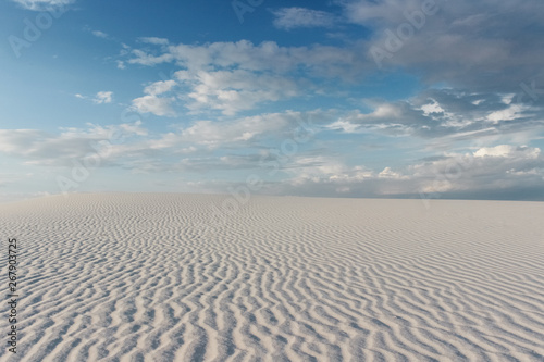 desert landscape with sand ripples, blue sky and clouds at White Sand National Monument, New Mexico