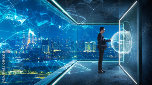 Businessman in suit working with virtual 3d holographic interface screens . Futuristic business, technology, internet and social networking technology concept .