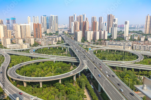 city highway interchange with blue sky, aerial view of modern traffic background.Wuhan, the largest transportation and economic hub city in central China.