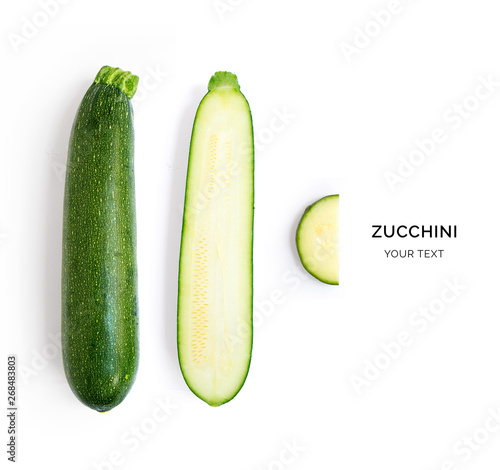 Creative layout made of green zucchini Flat lay. Food concept.