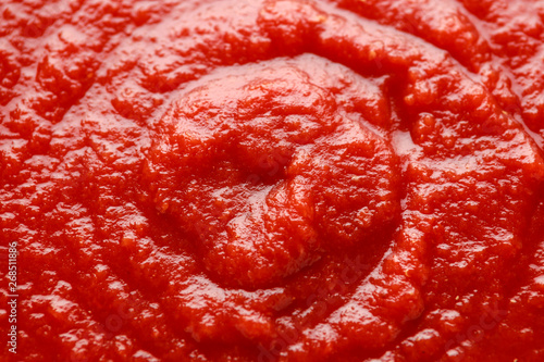 Homemade tomato Passata sauce closeup, background, texture.