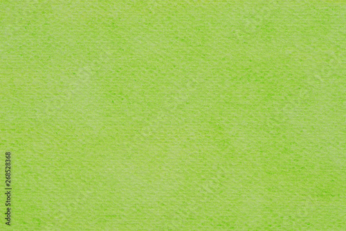 green watercolor painted on paper background texture macro