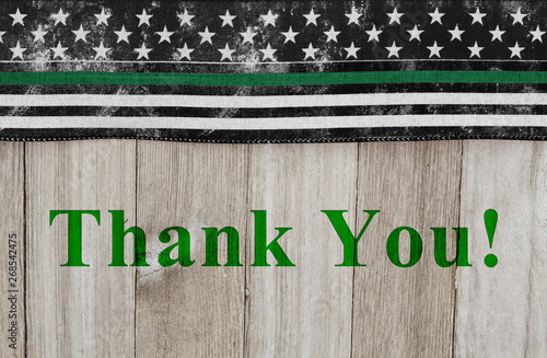 Thank You message on an American thin green line flag for border patrol agents