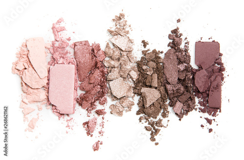 A smashed, neutral toned eyeshadow make up palette isolated on a white background