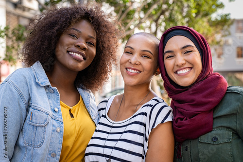 Multiethnic young friends enjoying together