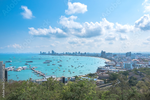 Pattaya beach with blue sky and cloud, view from Phra Tamnak mountain viewpoint in Pattaya city, Thailand