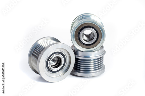 Freewheel alternator pulleys on isolated white background. Auto electrical parts.