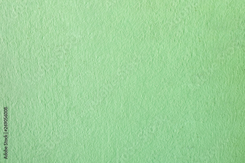 Green Dirty cement wall background.