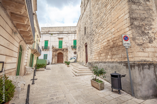 View of the old town of Martina Franca with a beautiful houses painted in white.