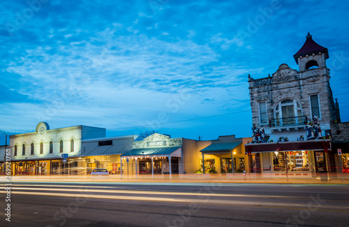 Fredericksburg, Texas, USABeautiful city night scape of road and land transportation against lighting