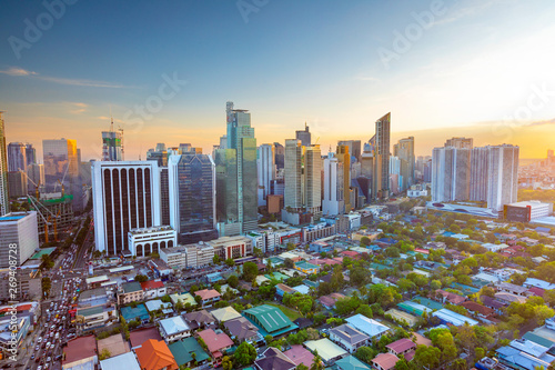Elevated, sunset view of Makati, the business district of Metro Manila, Philippines