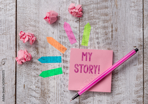 Conceptual hand writing showing My Story. Concept meaning your past life events actions or choices you made Note paper and line arrow stickers on the top of wooden table desk