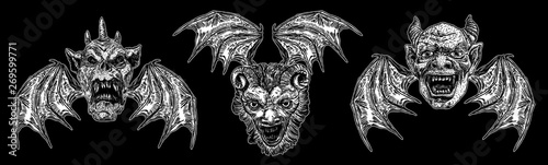 Set of devil heads with big demon horns or antlers and sharp fangs. Satan or Lucifer fallen angels depiction with vampire wings. Gargoyle like chimera fantastic beast creature with scary face Vector.