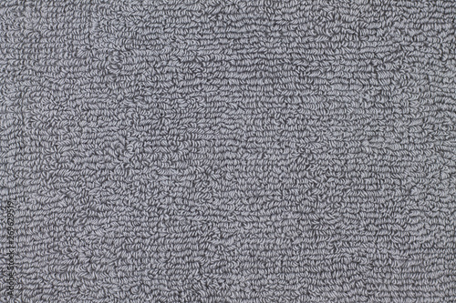 Gray towel texture. Closeup of a towel terry cloth.