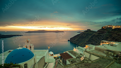 Sunset at Santorini Island in Greece, one of the most beautiful travel destinations of the world.