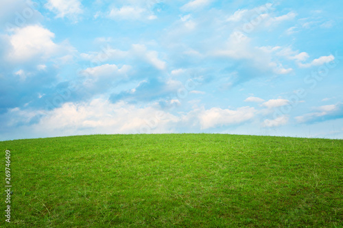 Beautiful simple hill landscape with clouds background