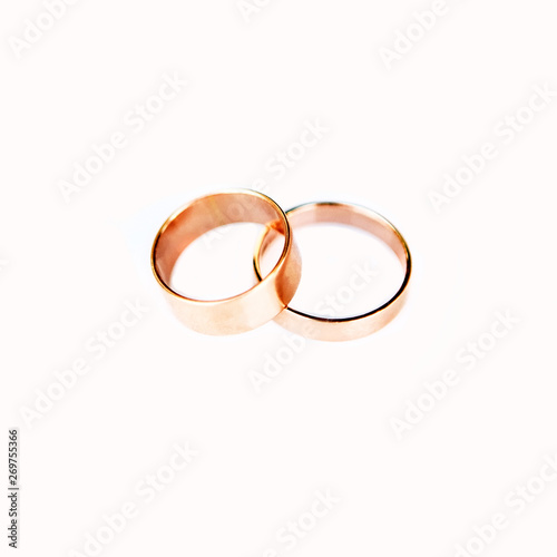 wedding rings. jewelry white and yellow gold. wedding ring on a white background.