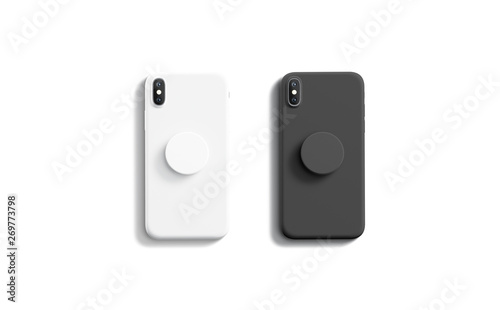 Blank black and white pop sockets attached on mobile phone mockups, isolated, top view, 3d rendering. Empty rubber popsocket holder on smartphone mock up. Clear round handle stick on cellphone.