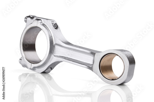 Connecting rod from a car engine isolated on white